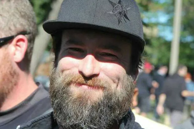 RAISING A GLASS FOR GREG